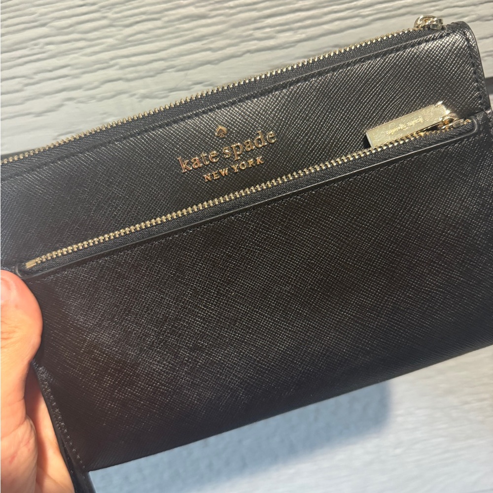 Black Kate Spade clutch never used